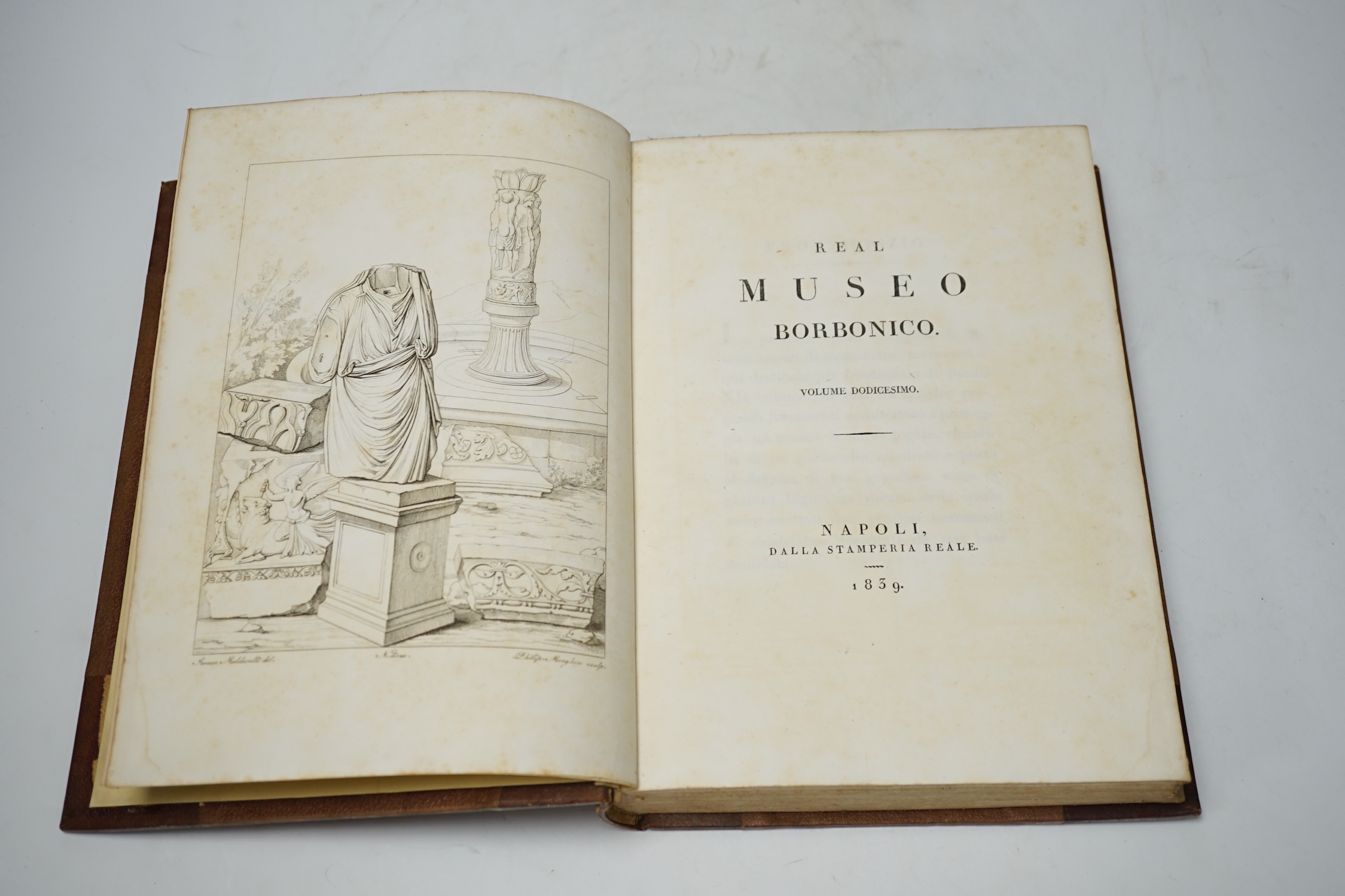 Real Museo Borbonico. vols. I-12 (only, ex 16). many engraved plates (some folded); mid 19th cent. gilt ruled maroon half morocco and cloth with panelled spines and gilt tops, 4to. Naples, 1824-39
